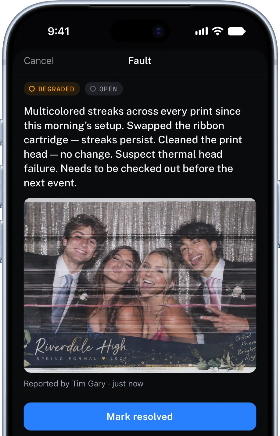 A flagged gear fault: a printer reporting streaked prints, with a photo of the defect and the crew member who reported it.